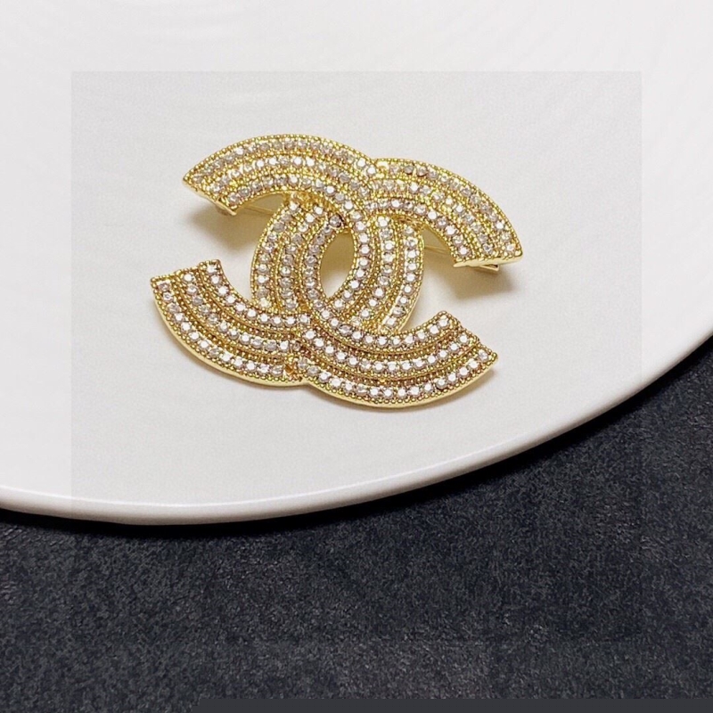 Ch*el brooches